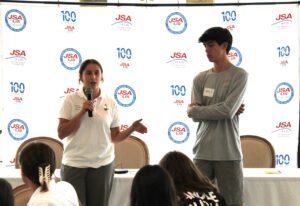 Two Head Instructors present a breakout group report